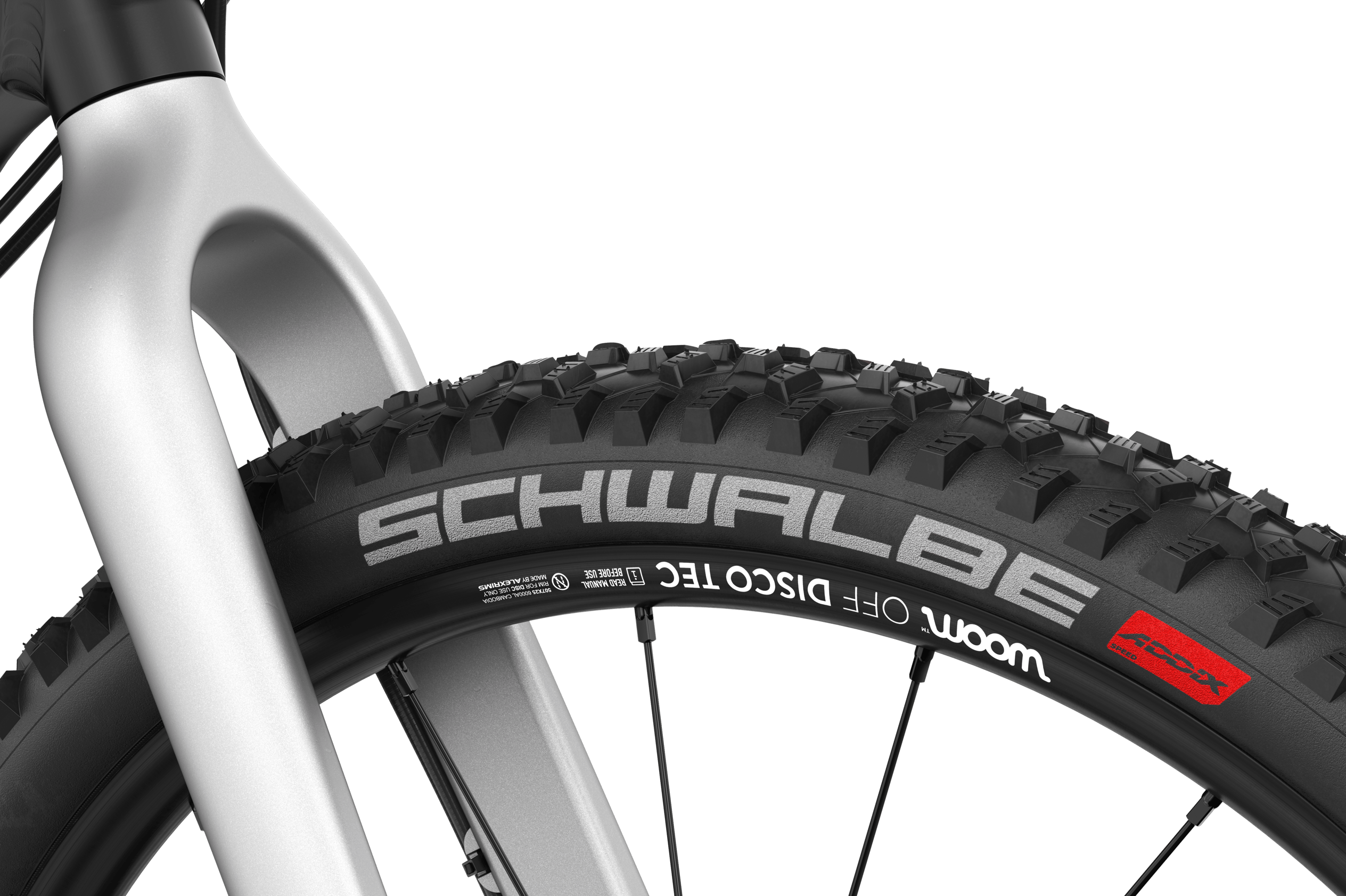 Detailed view of the front Schwalbe mountain bike tire on the woom OFF 5 children's mountain bike.