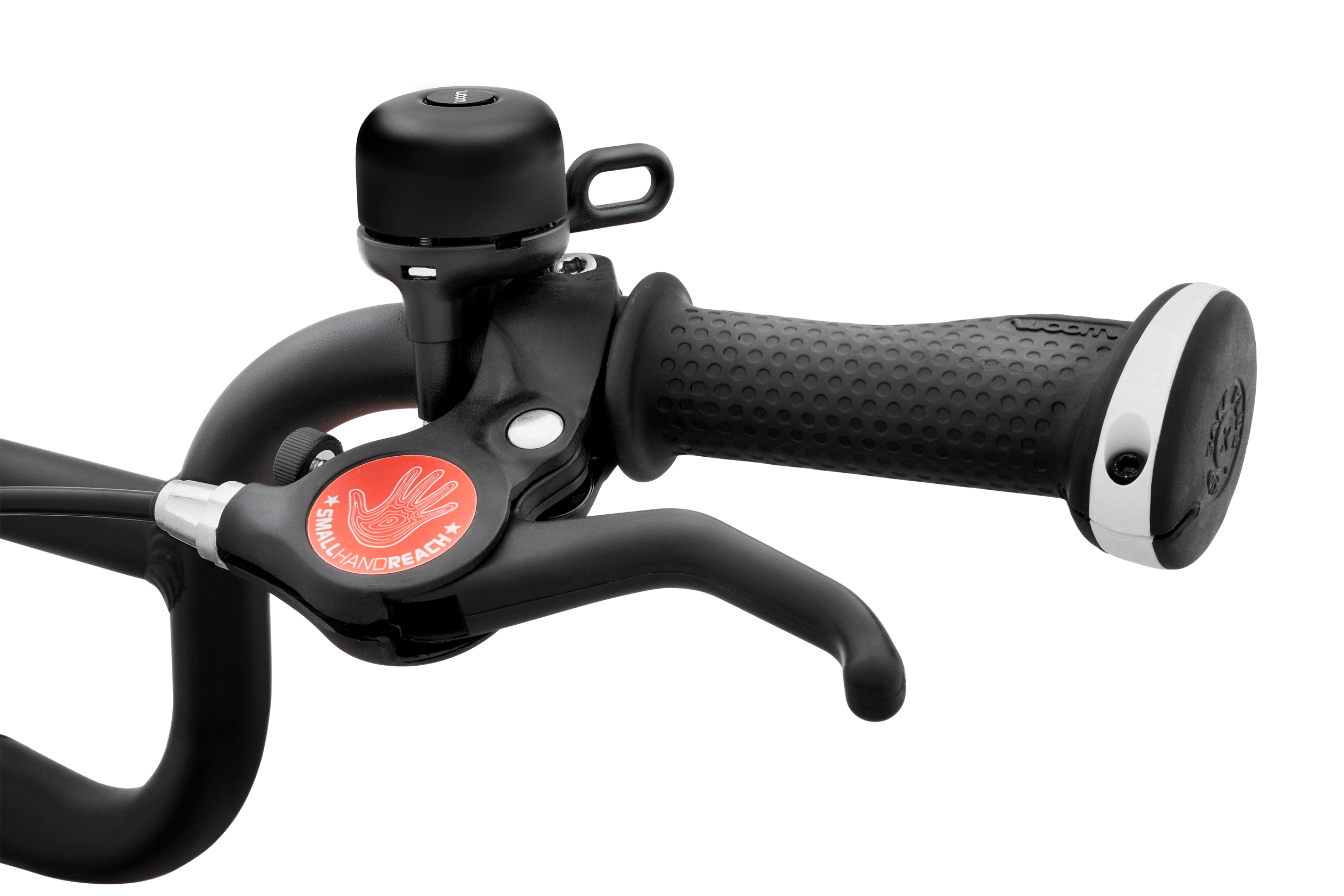 Black BING bicycle bell mounted on the handlebars of a woom bike.