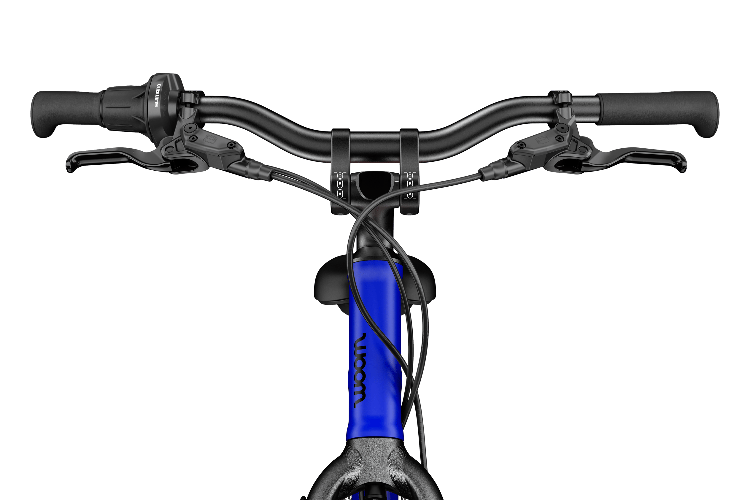 Frontalt, detaljeret billede af styrerør, frempind, styr og greb på en woom EXPLORE 4 børnecykel.