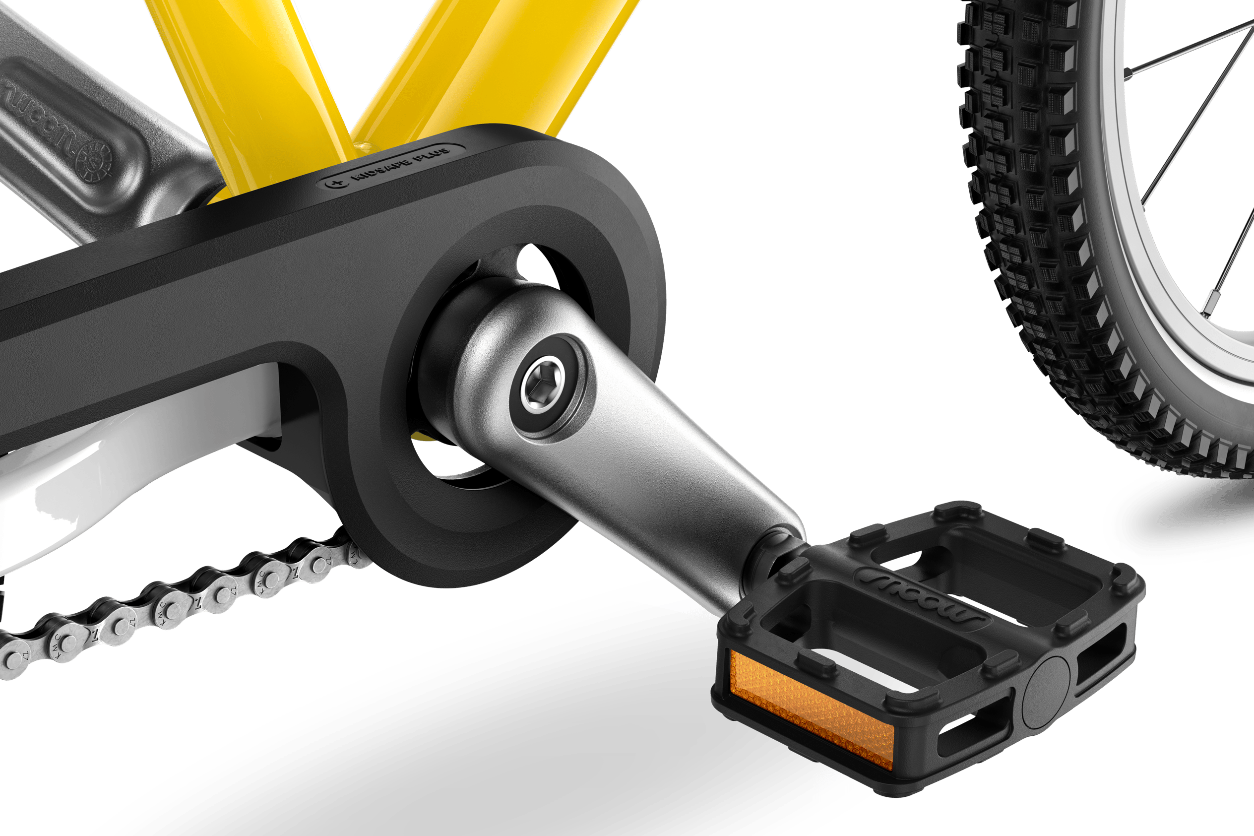 Detailed view of the cranks, pedals and chainguard on the woom GO 3 AUTOMAGIC children's bike
