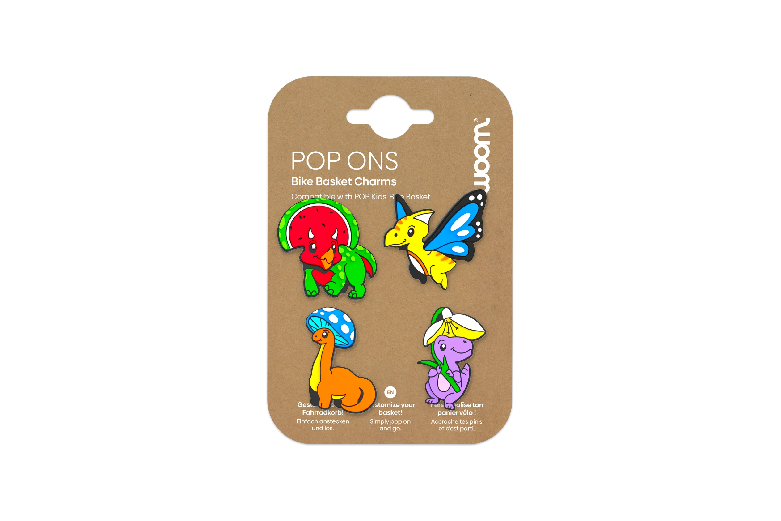 Vier bunte woom POP ONS Dinosaurier-Pins auf einer Pappkarte.
