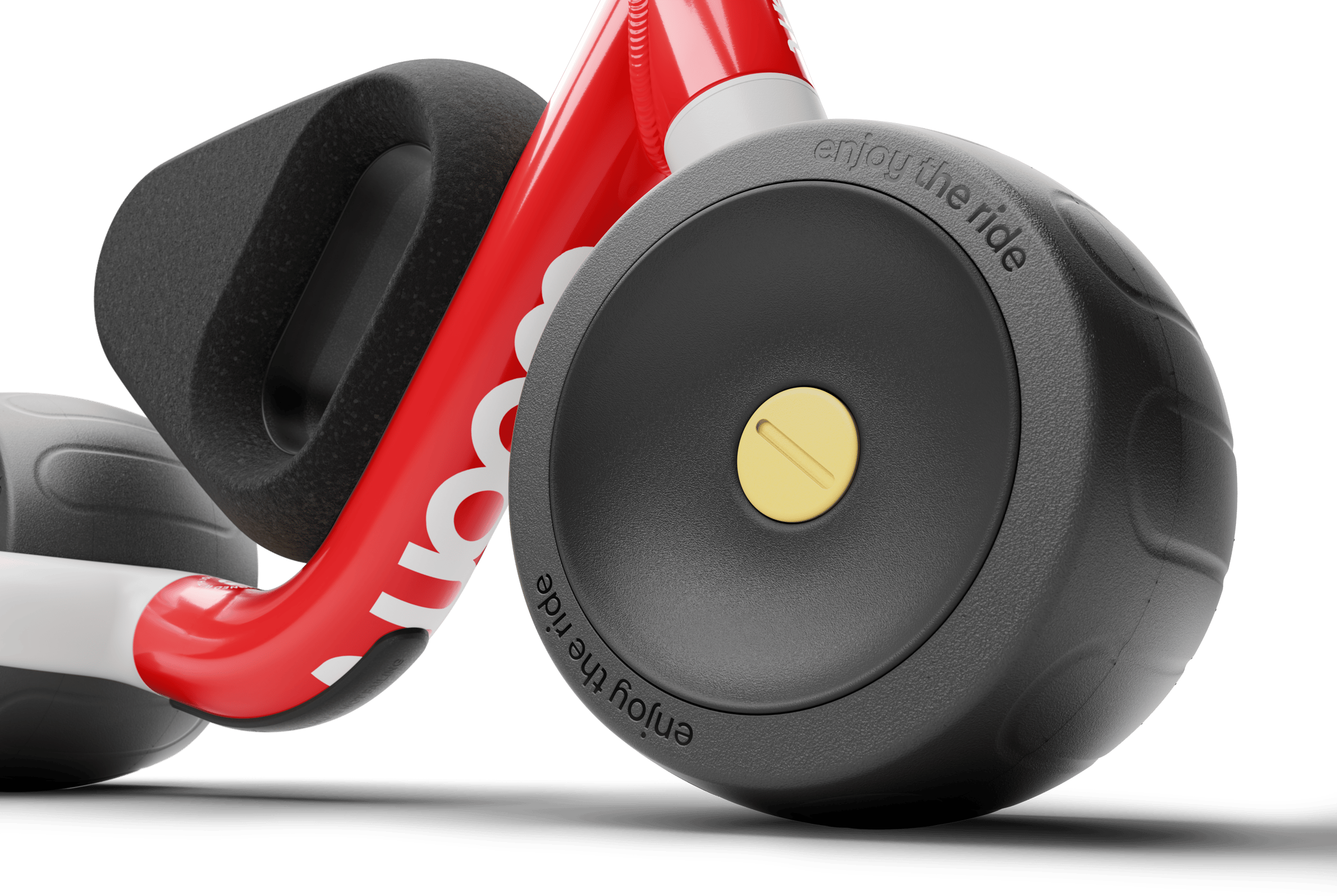 Front wheel on woom WOW viewed slightly from right, with hub in contrasting color and "enjoy the ride" text on tire.