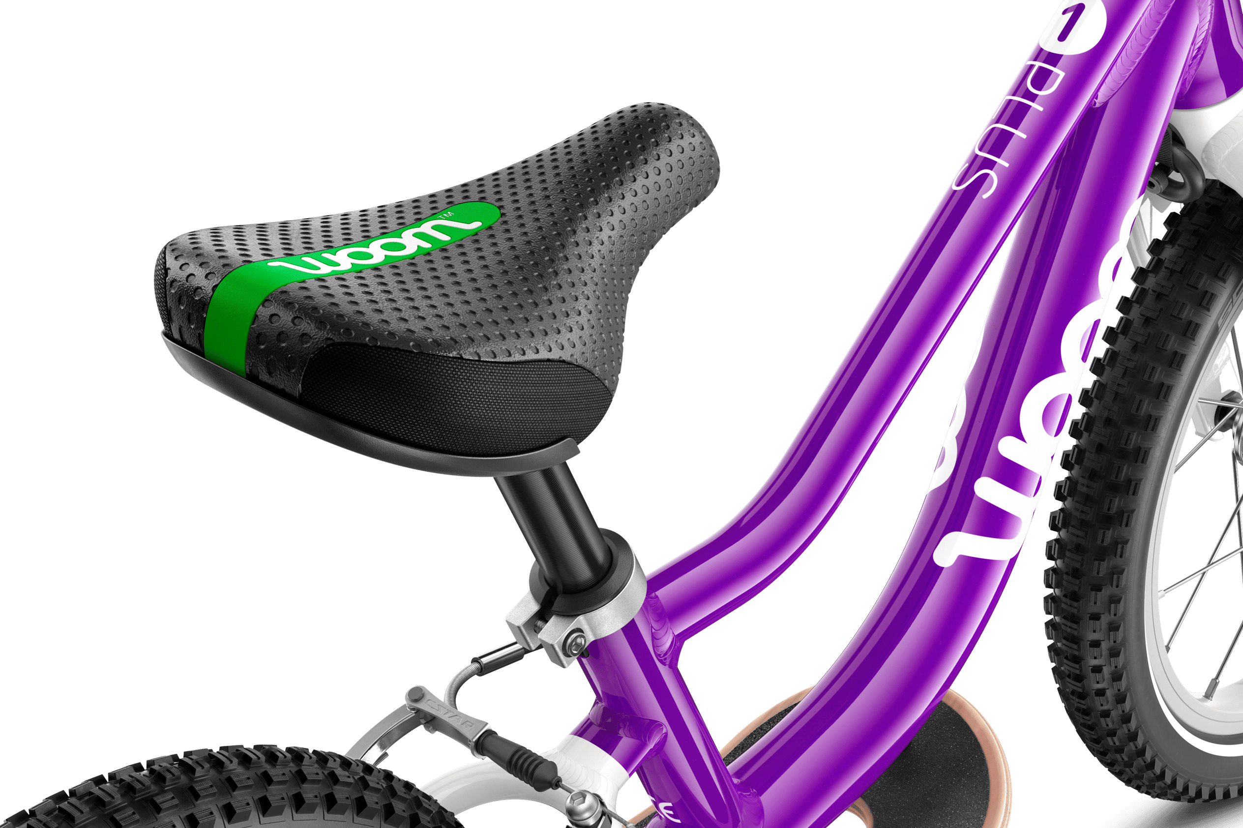 Detailed view of the curved saddle on the woom ORIGINAL 1 PLUS balance bike.