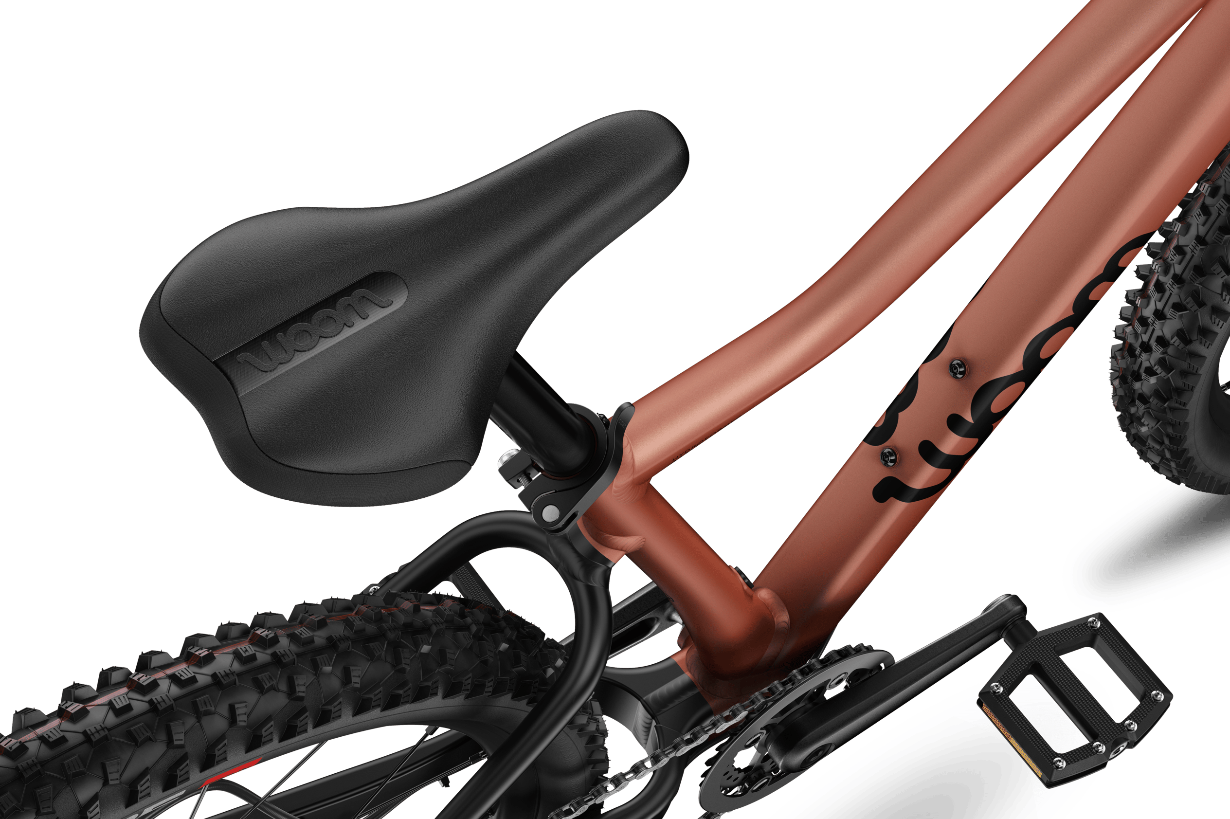 Detailed view of the saddle on the woom OFF 5 children's mountain bike.