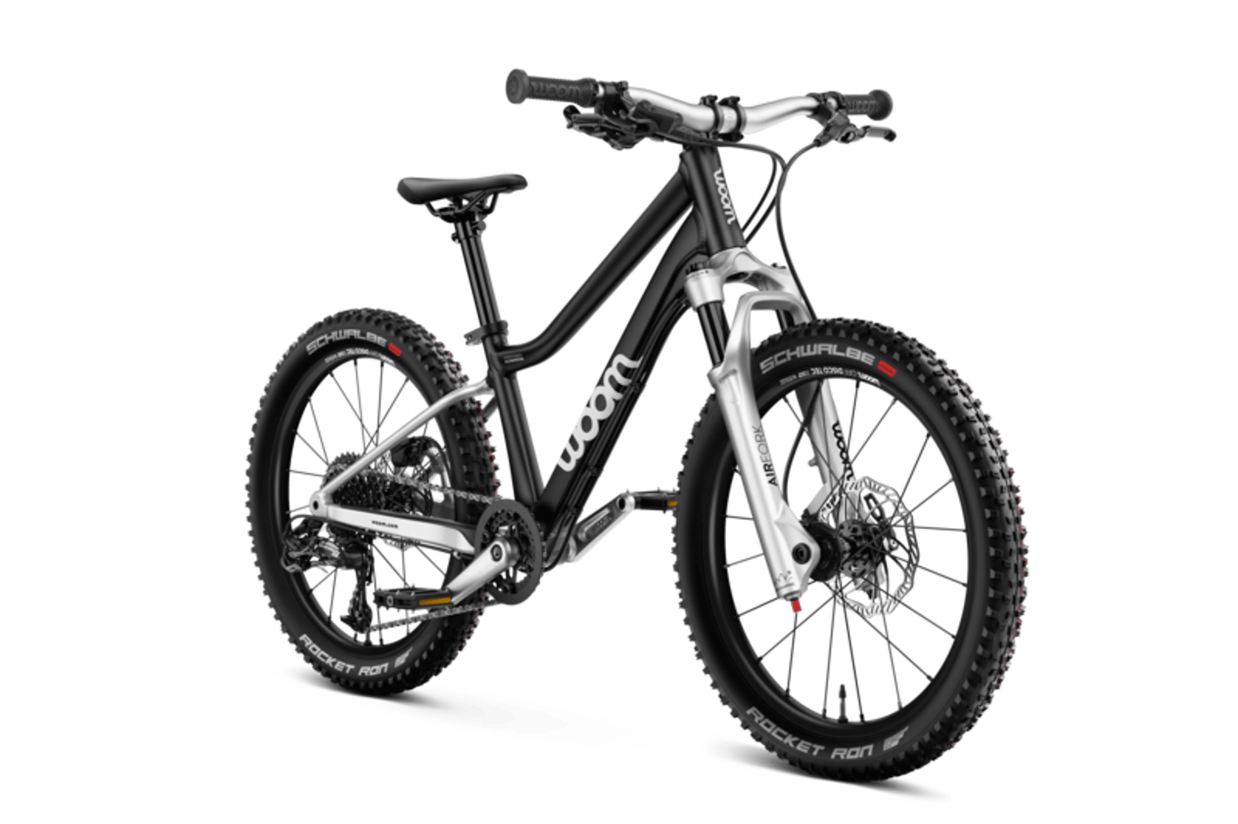 Vue latérale de face du VTT enfant woom OFF AIR 4 pour les enfants à partir de six ans.