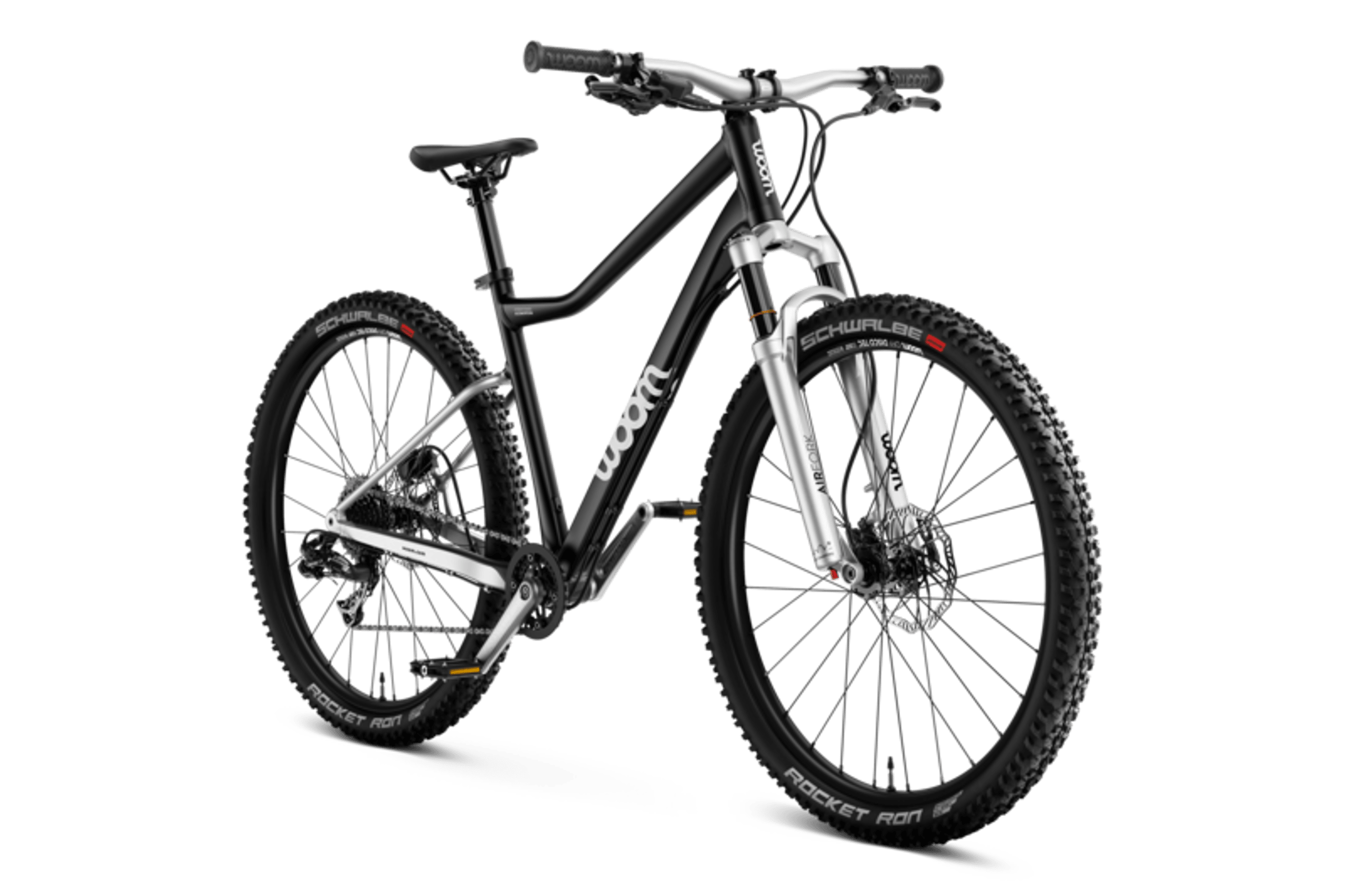 Vue latérale de face du VTT enfant woom OFF AIR 6 pour les enfants à partir de dix ans.