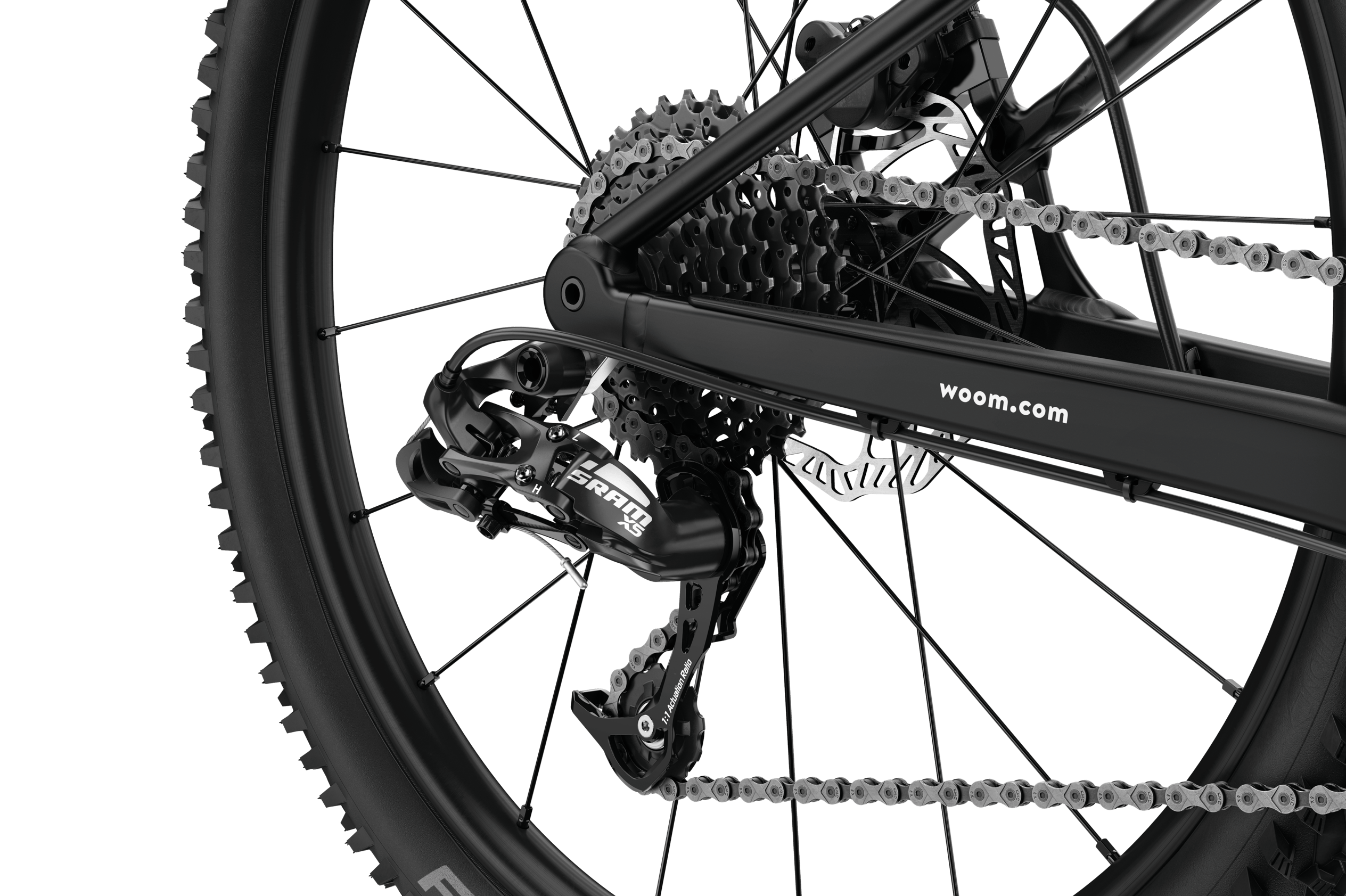 Detailed view of the SRAM X5 rear derailleur on the woom OFF AIR 5 children's mountain bike.