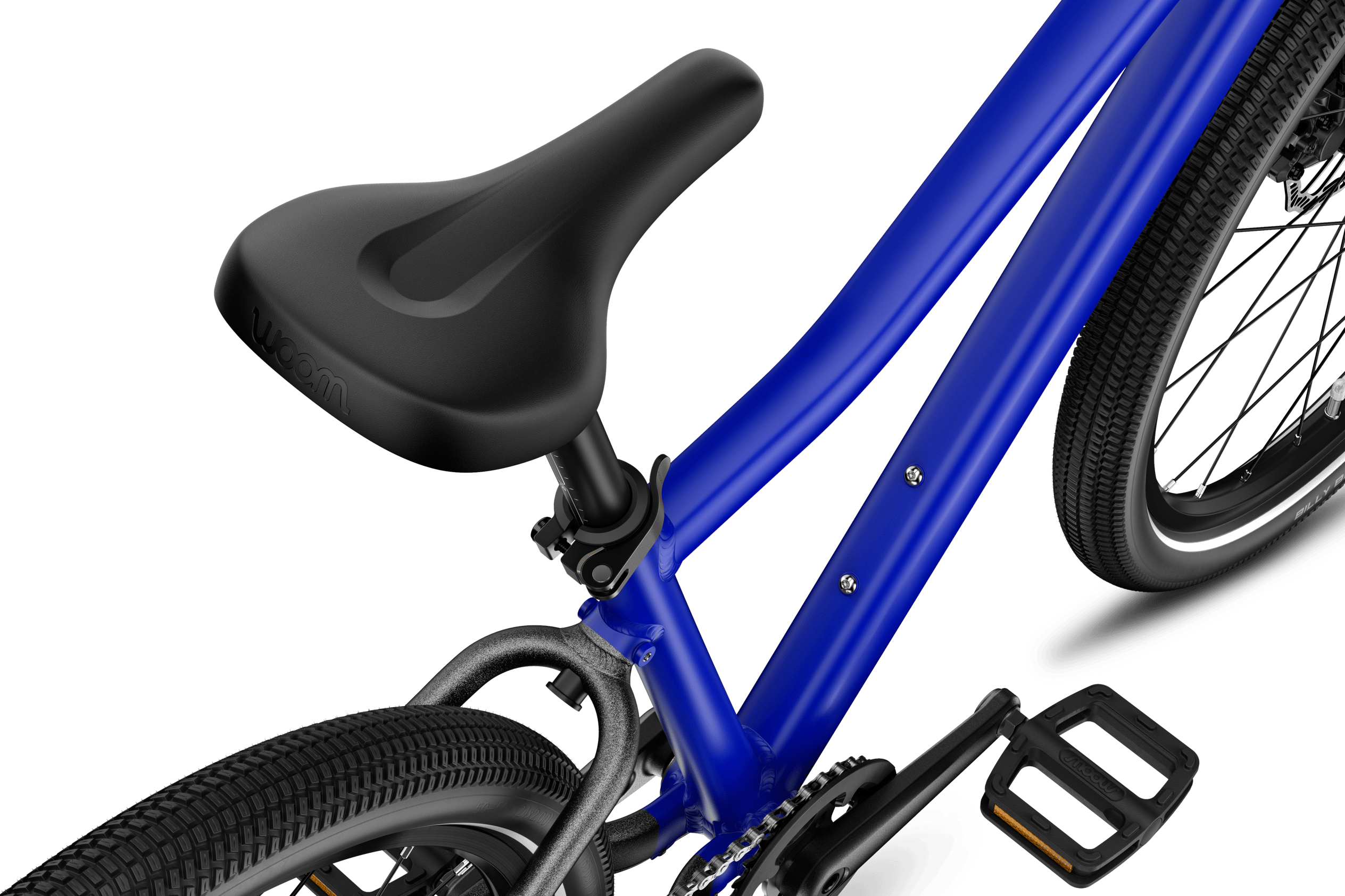Detaljerad vy av den svarta sadeln på woom EXPLORE 4-barncykeln.