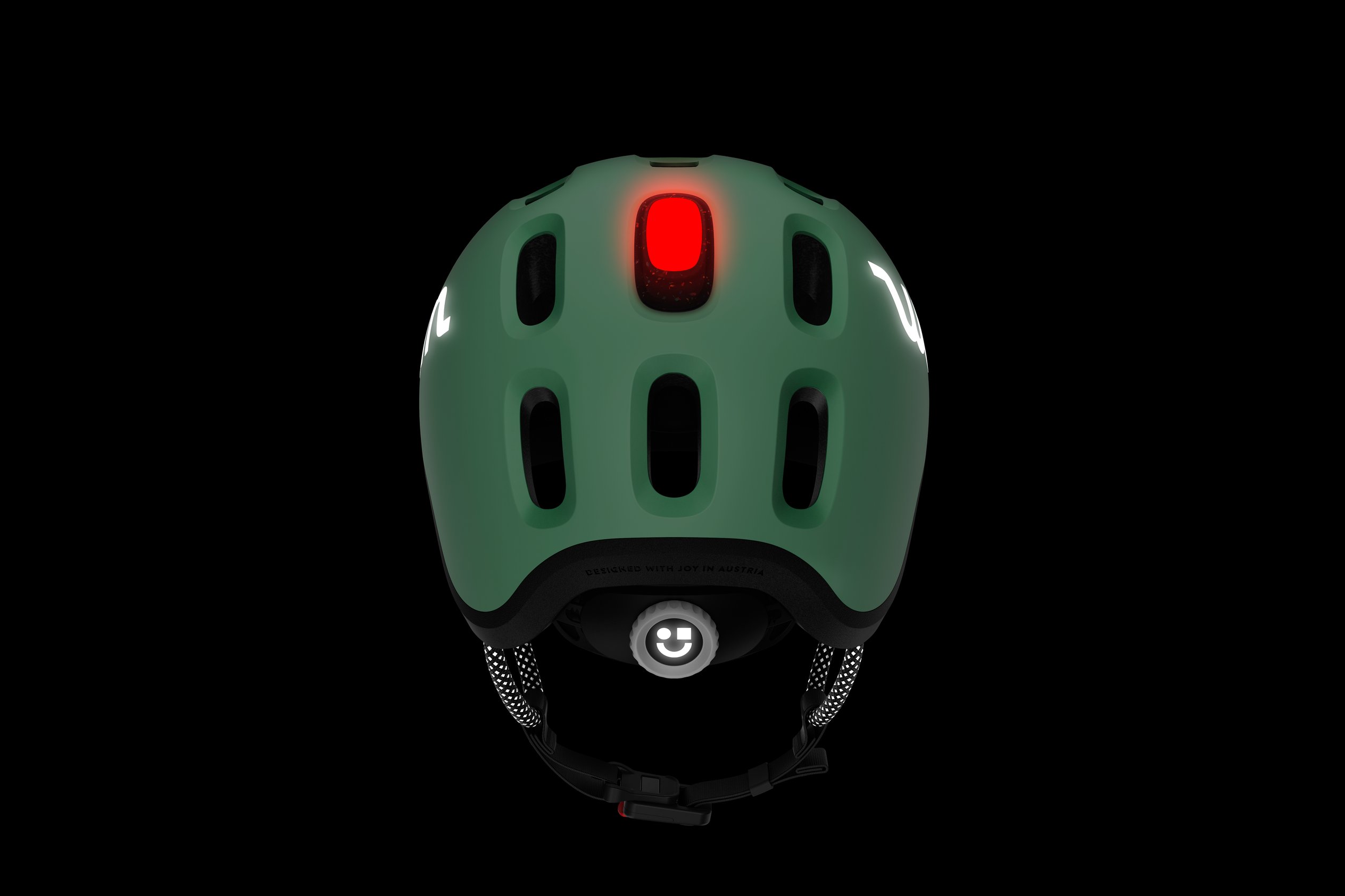 Achteraanzicht van de READY-kinderhelm met een rood ledachterlicht dat in het bovenste ventilatiegat is bevestigd