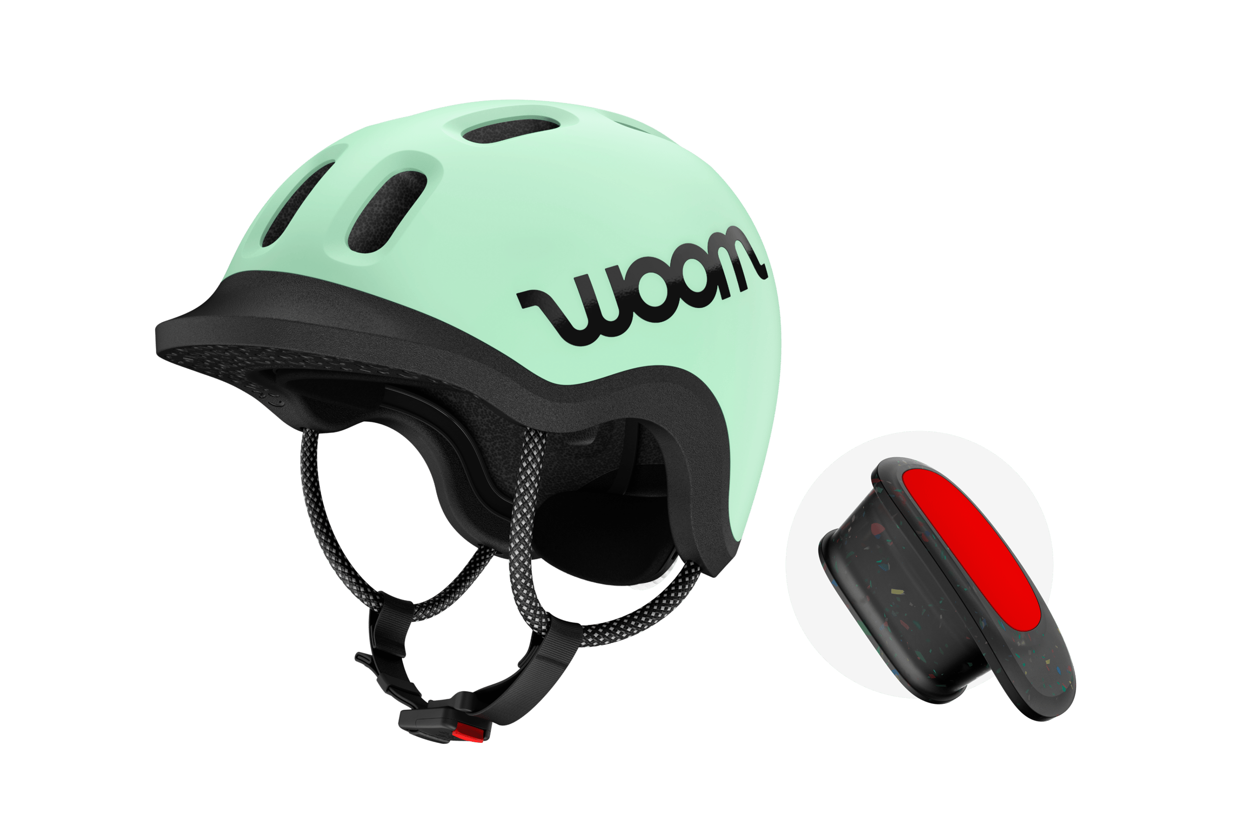 Aanzicht schuin van voren van de READY-kinderhelm en de bijpassende READY-helmlamp van woom