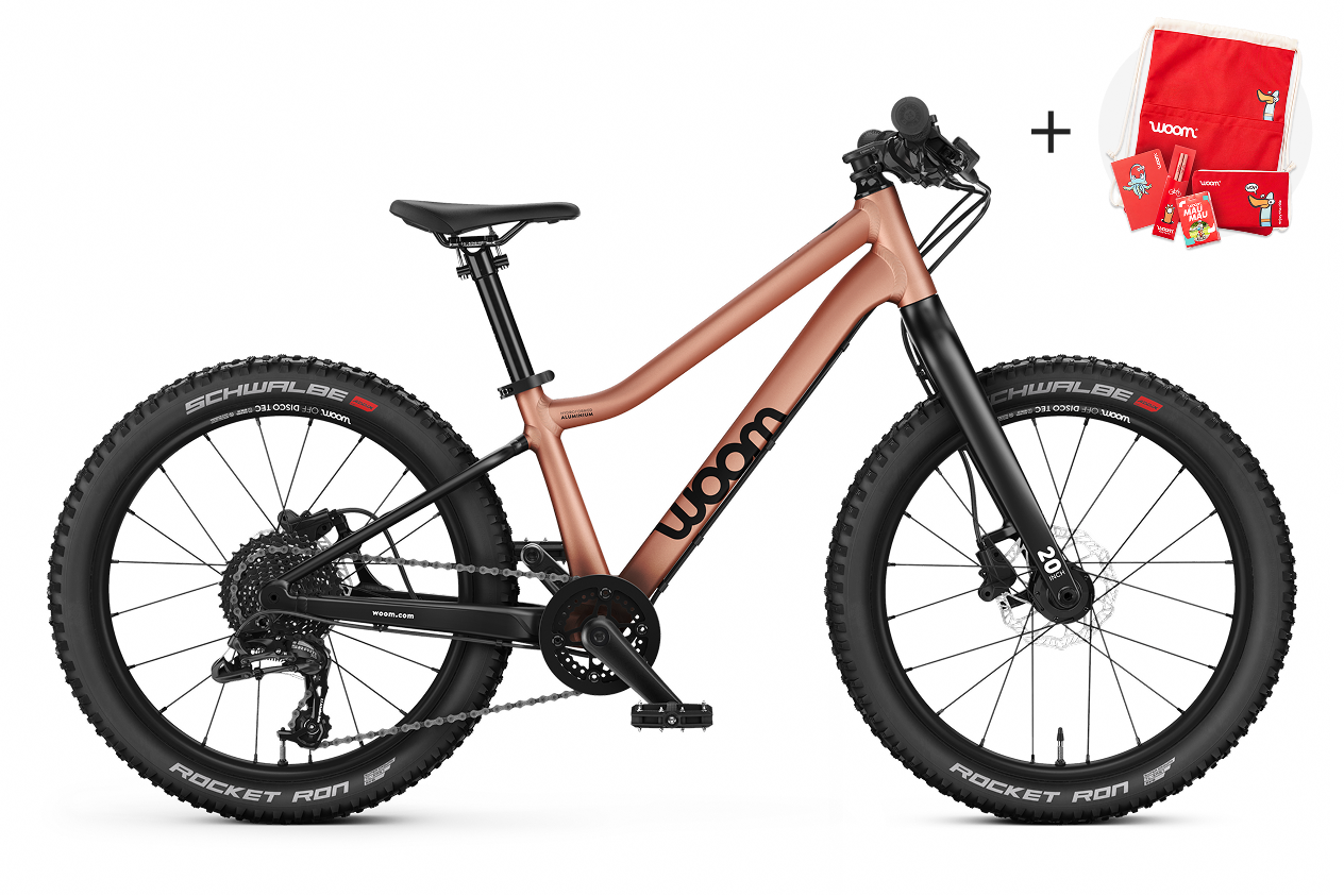 Profile view of the woom OFF 4 mountain bike for children aged 6 years and up.