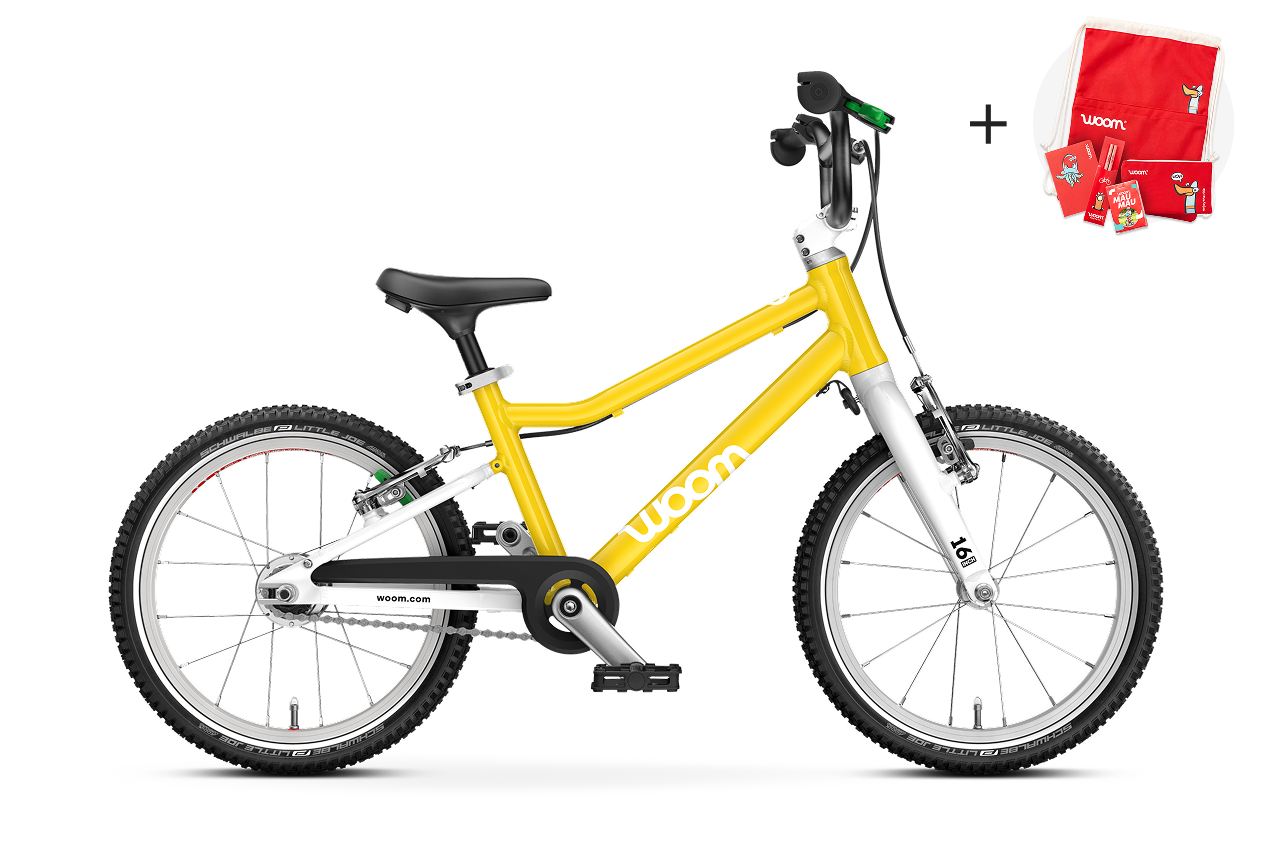 Sidovy av barncykeln woom GO 3 AUTOMAGIC för barn från fyra år