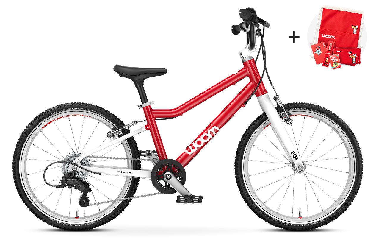 Vue latérale du vélo enfant woom GO 4 pour les enfants dès six ans