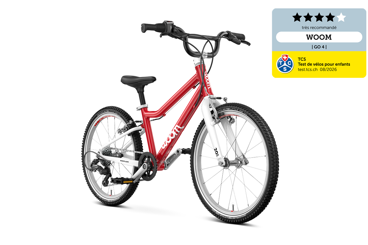 Vue latérale de l’avant du vélo woom GO 4 pour les enfants à partir de six ans