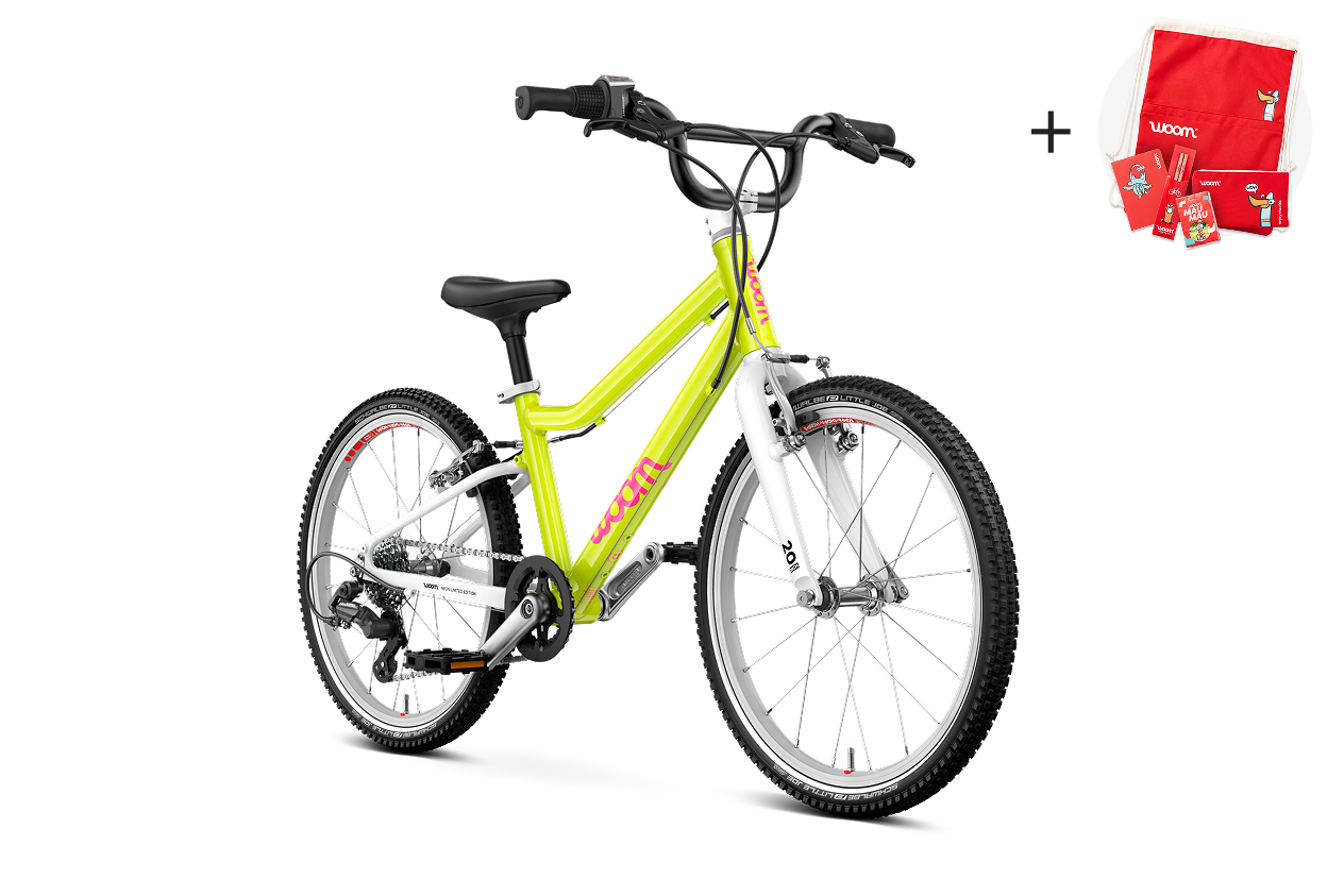 Vue latérale du vélo enfant woom GO 4 pour les enfants dès six ans