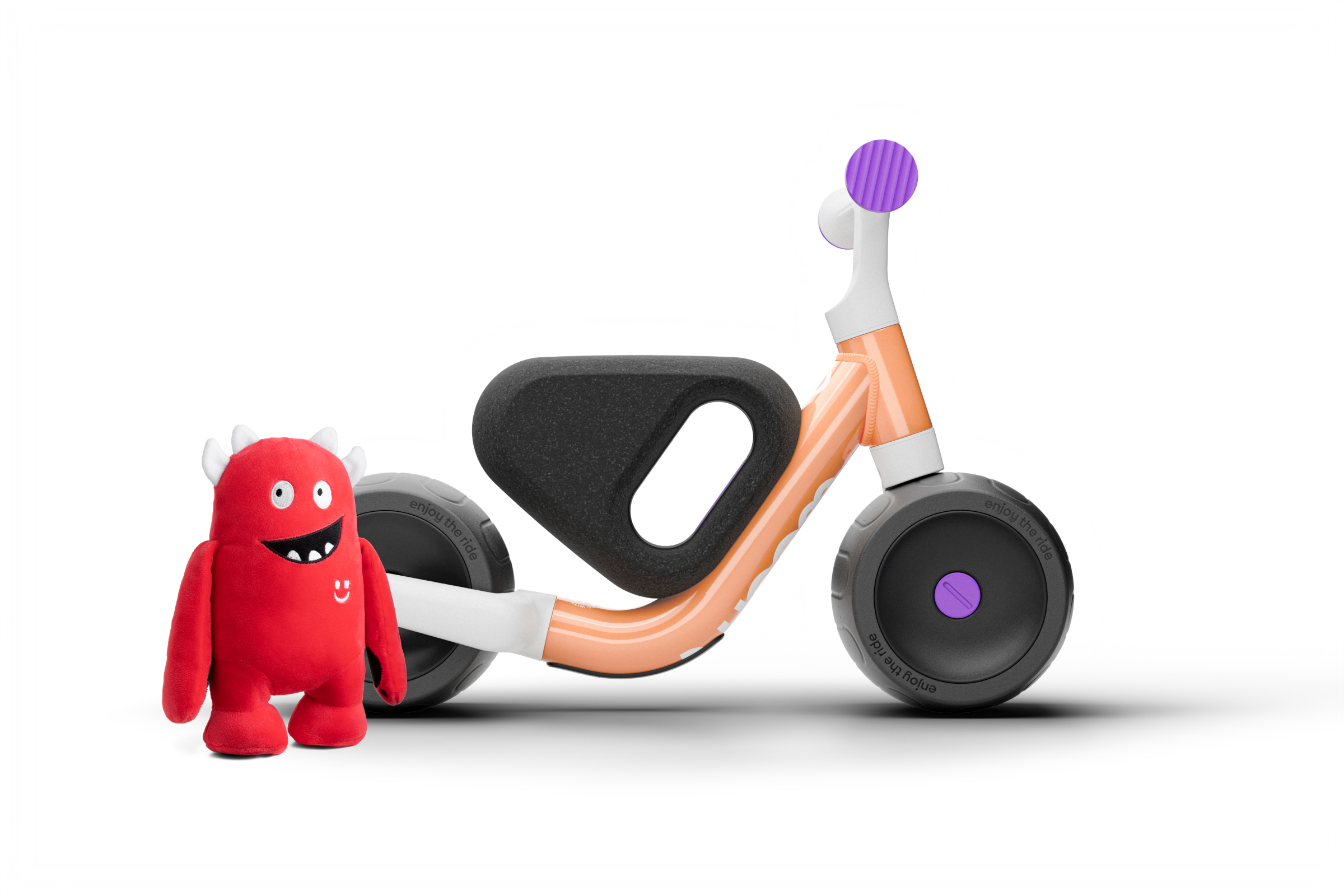 Side view of the woom WOW, with the bike facing right and the seat, handlebars and tires visible from the side.