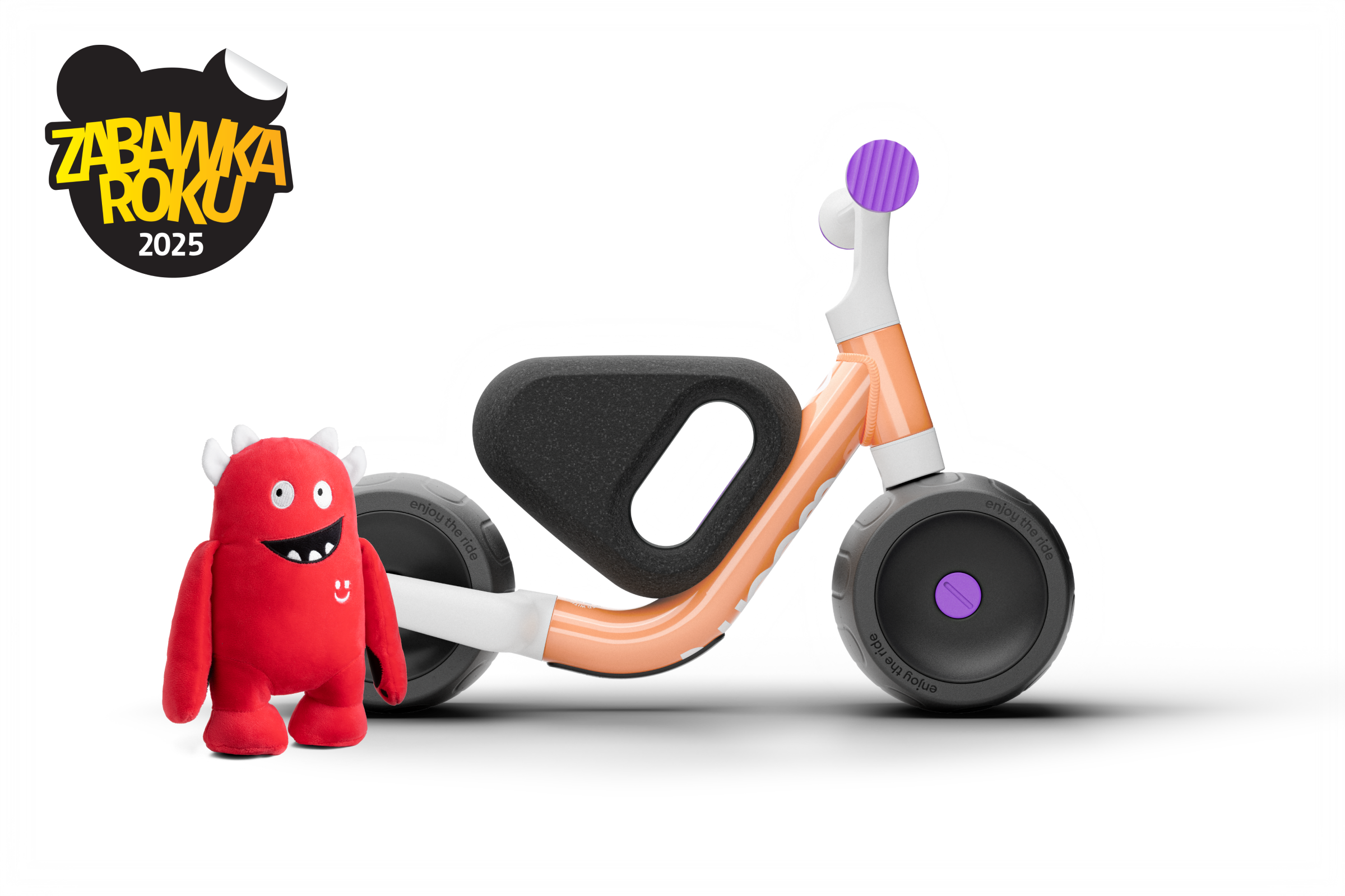 Widok boczny roweru woom WOW, rower skierowany w prawo, widoczne z boku siodełko, kierownica i opony.