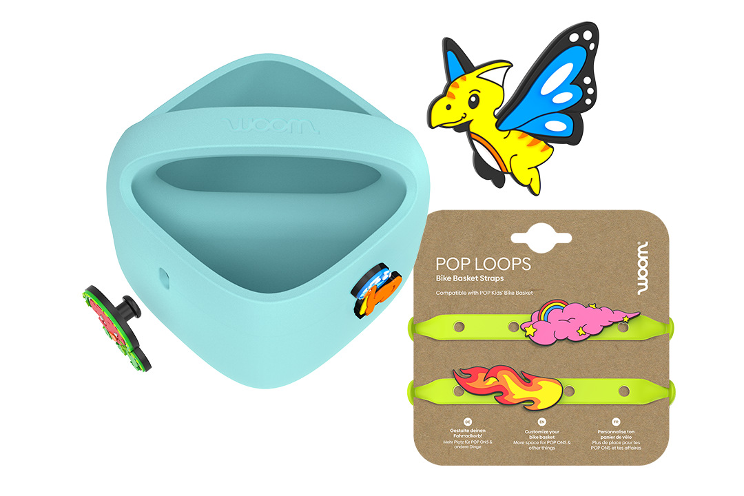 Purple woom POP Kids' Bike Basket with POP ONS plus neon-green POP LOOPS on card and a new flying dino charm