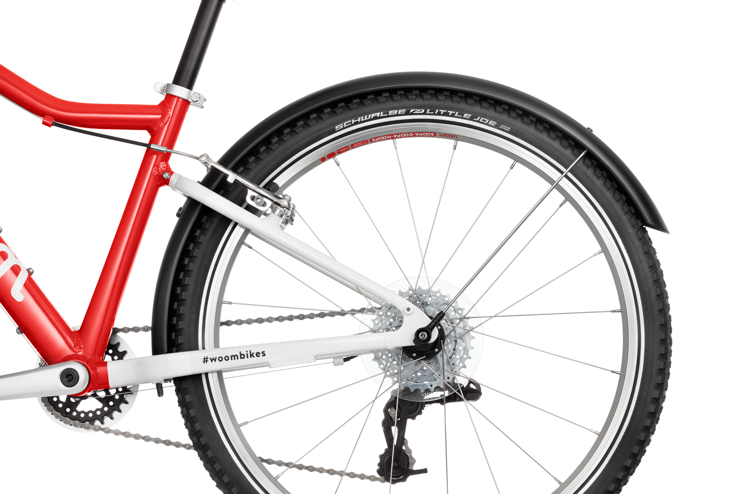 SNAP clip-on mudguard mounted on the rear wheel of a red woom kids' bike.