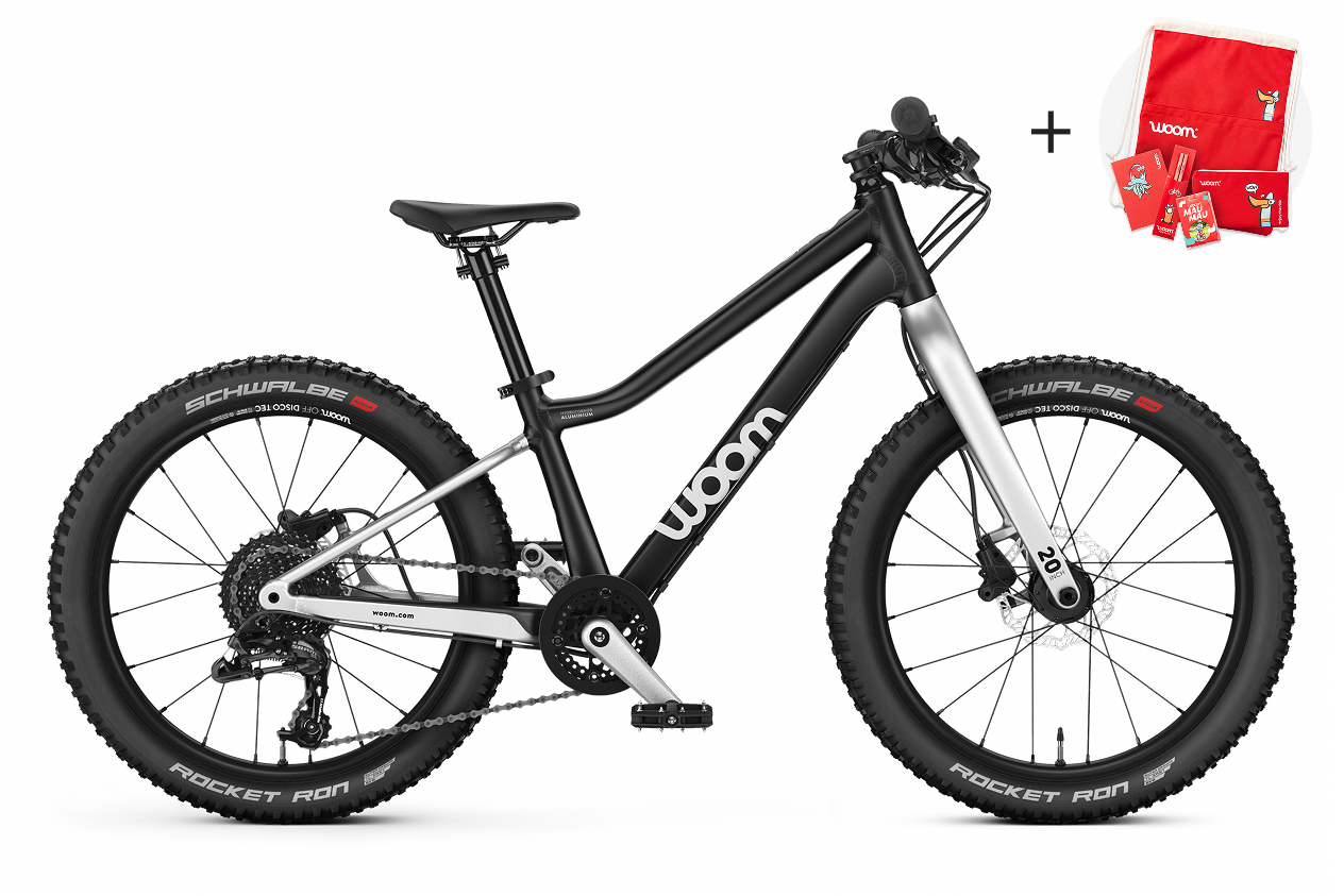 Vue de côté du VTT enfant woom OFF 4 pour les enfants à partir de six ans.