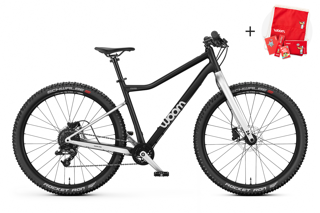 Vue de côté du VTT enfant woom OFF 6 pour les enfants à partir de dix ans.