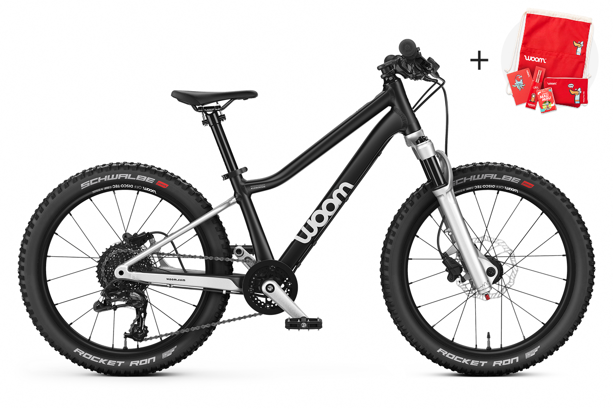 Vue de côté du VTT enfant woom OFF AIR 4 pour les enfants à partir de six ans.