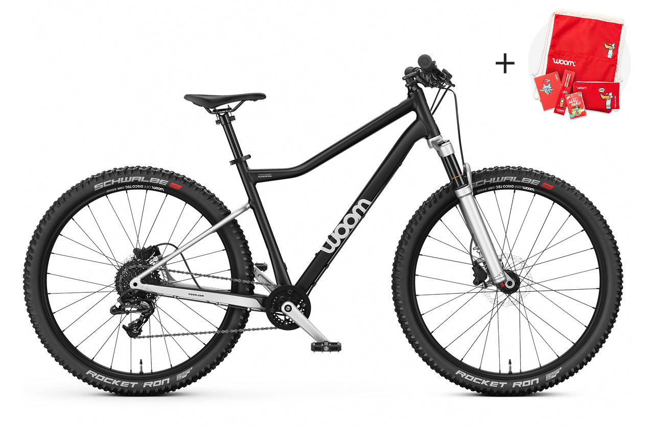 Vue de côté du VTT enfant woom OFF AIR 6 pour les enfants à partir de dix ans.