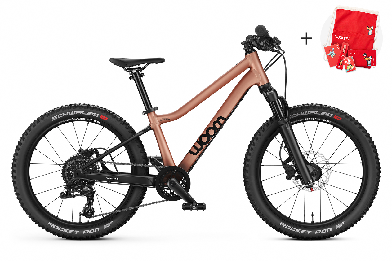 Profile view of the woom OFF AIR 4 mountain bike for children aged 6 years and up.