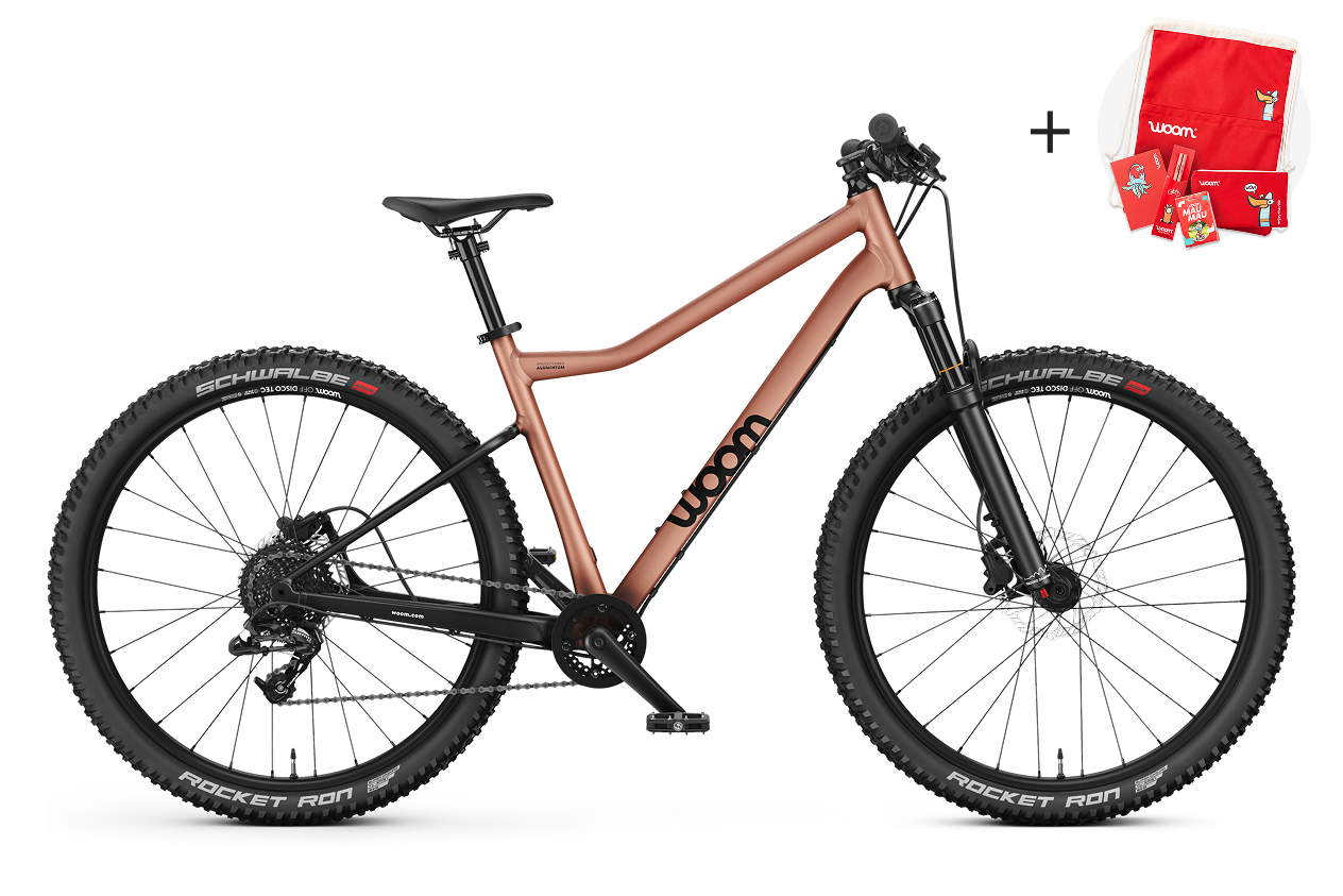 Profile view of the woom OFF AIR 6 mountain bike for children aged 10 years and up.