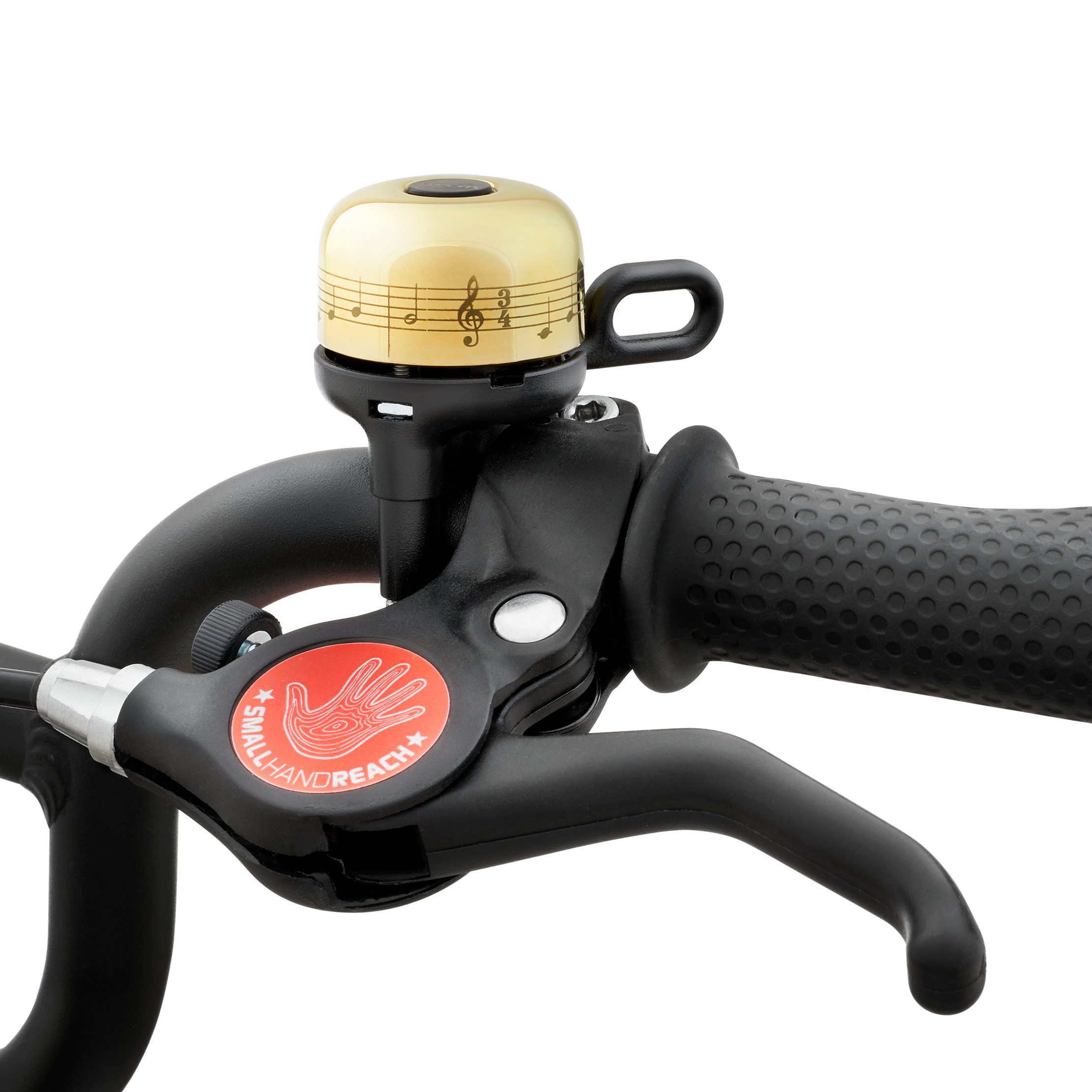 Cloche de vélo VIENNA BELL jaune doré montée sur le guidon d’un vélo woom.
