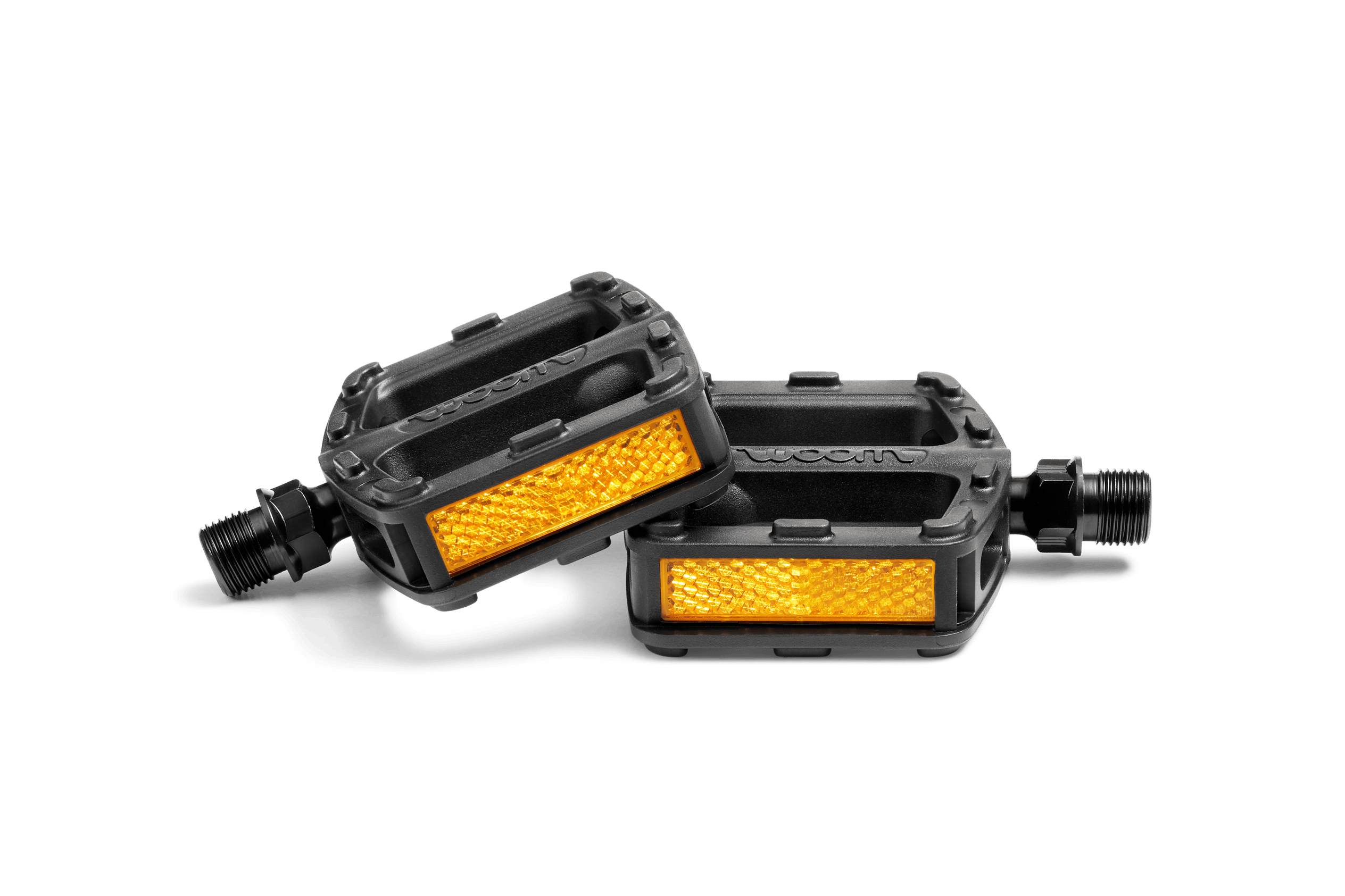 Two black bike pedals with orange reflectors
