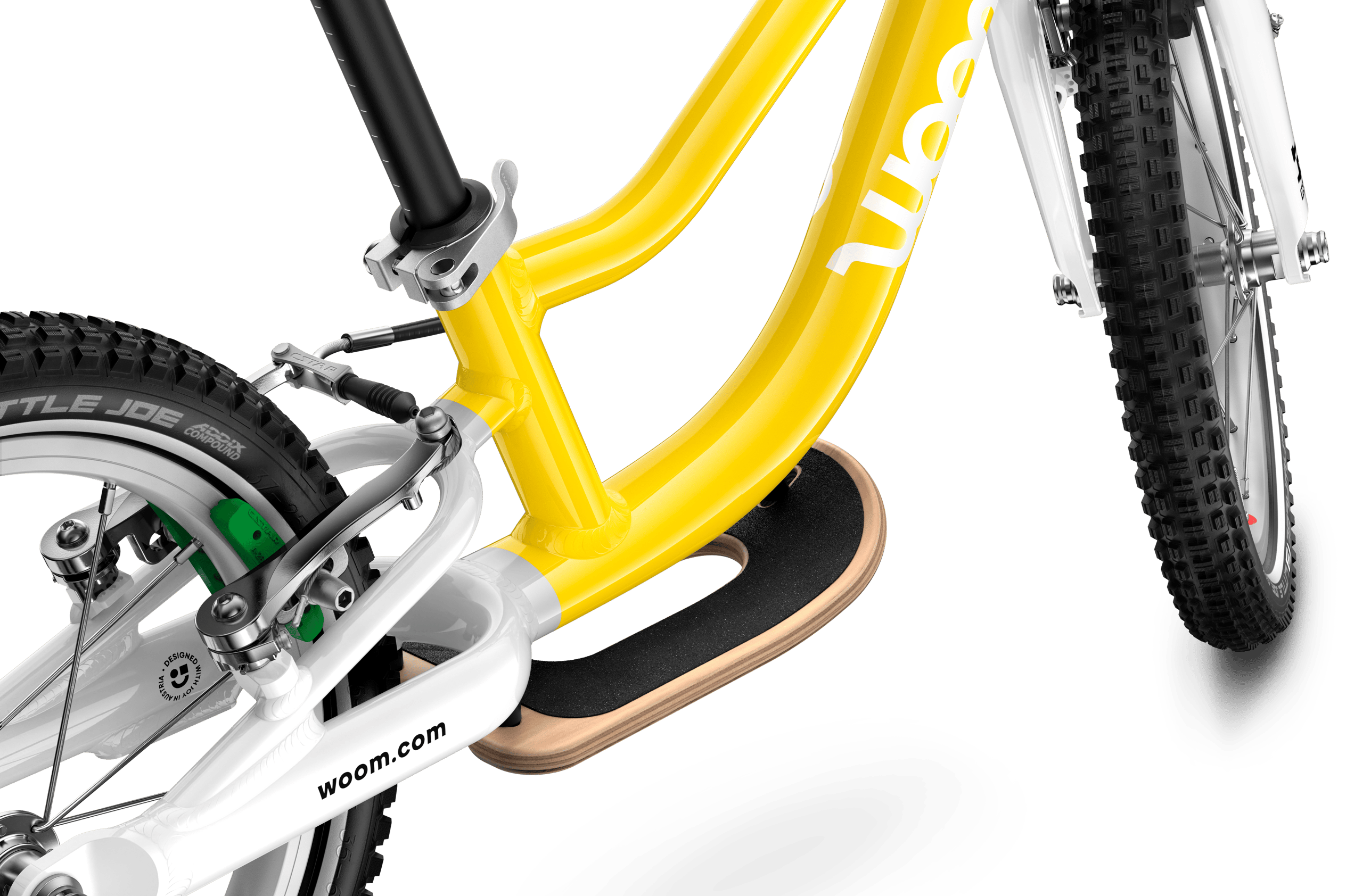 Detailed view of the wooden footrest that can be added to the woom GO 1 balance bike