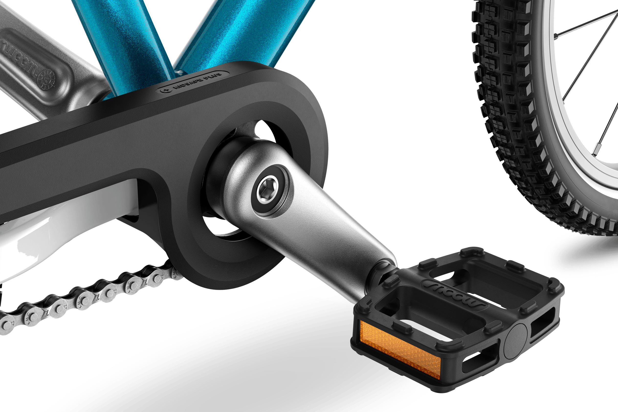 Detailed view of the cranks, pedals and chainguard on the woom GO 3 AUTOMAGIC children's bike