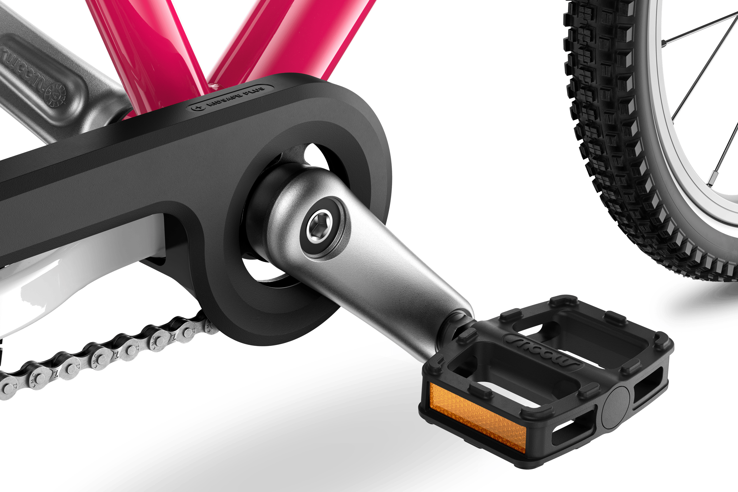 Detailed view of the cranks, pedals and chainguard on the woom GO 3 children's bike