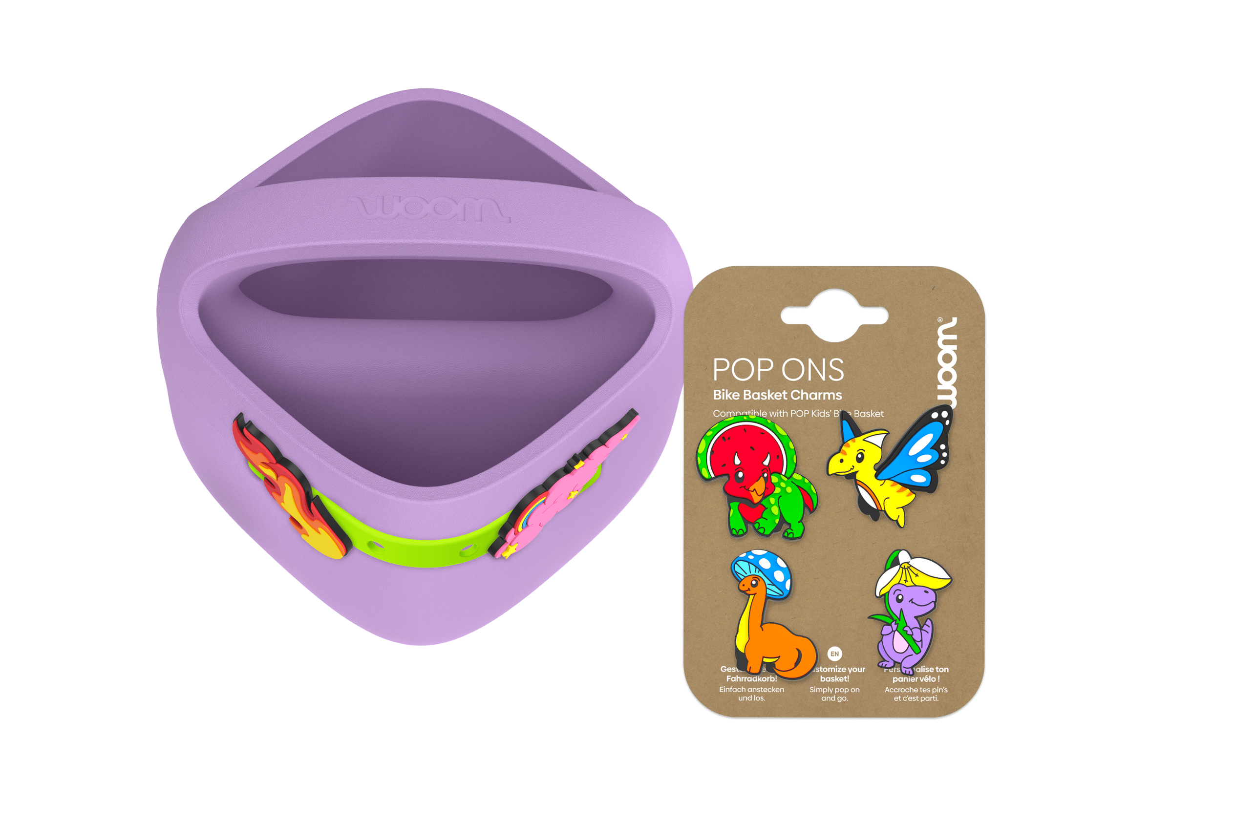 Purple woom POP Kids' Bike Basket with POP Loops and flame POP ONS charm next to a pack of colorful dinosaur POP ONS charms.